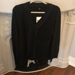 Black sweater with ribbon in detail